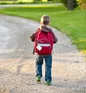 Child with schoolbag lost school things